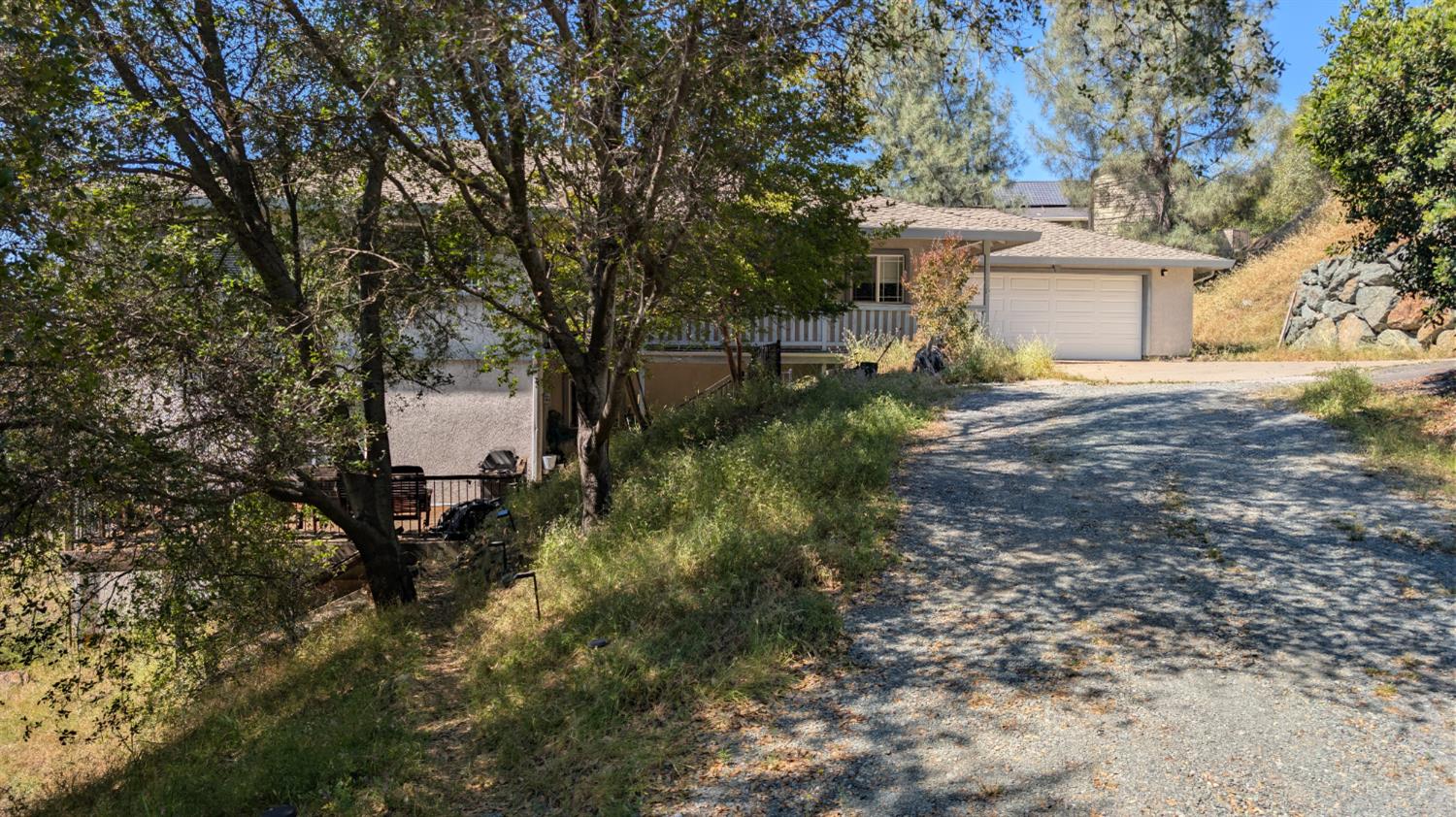 3248 Sudbury Road Cameron Park, CA 95682 - Photo 33 of 41 a view of a house with a yard and tree s