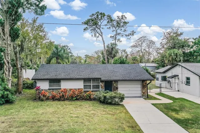 a aerial view of a house with garden