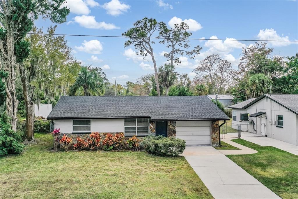 a aerial view of a house with garden