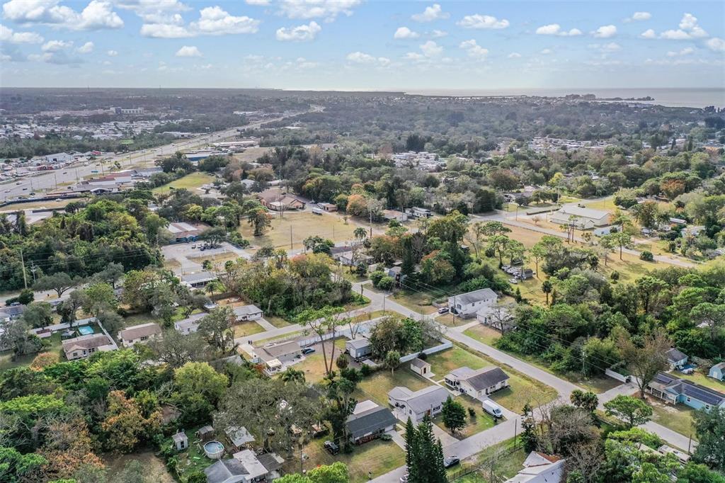 7806 Butler Avenue Hudson, FL 34667 - Photo 21 of 31 an aerial view of residential houses with outdoor space
