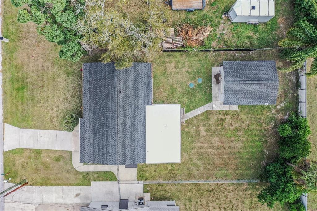 7806 Butler Avenue Hudson, FL 34667 - Photo 24 of 31 an aerial view of a houses with outdoor space