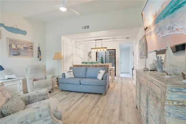 a living room with furniture and a table
