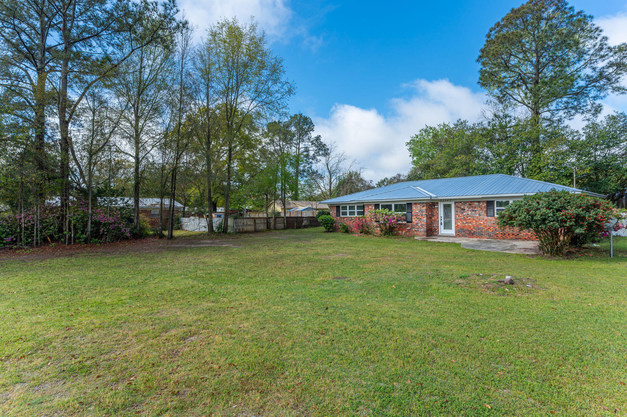 22543 Highway 331 Laurel Hill, FL 32567 - Photo 2 of 36 a view of a house with backyard