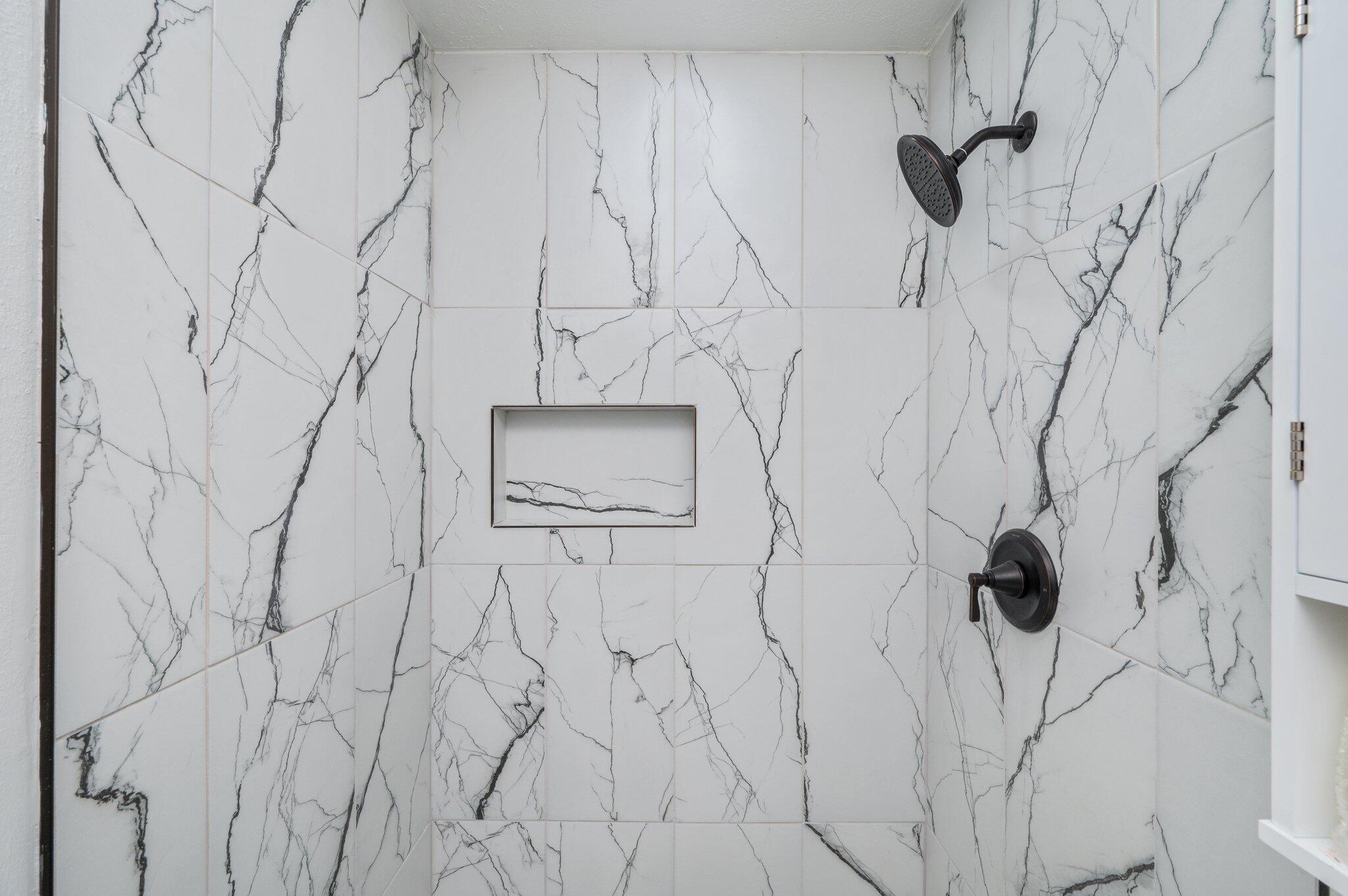 22543 Highway 331 Laurel Hill, FL 32567 - Photo 22 of 36 a bathroom with a shower