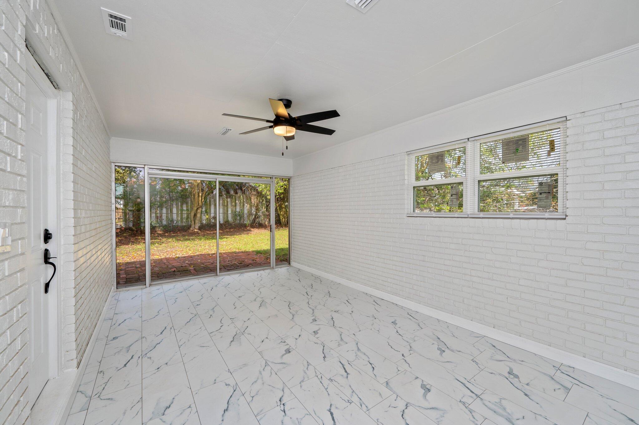 22543 Highway 331 Laurel Hill, FL 32567 - Photo 27 of 36 a view of an empty room with a window