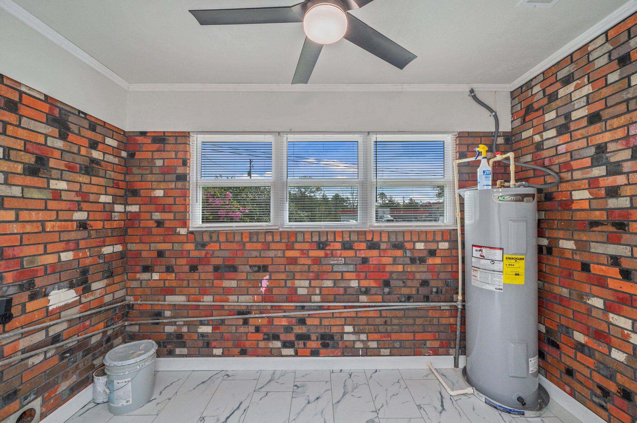 22543 Highway 331 Laurel Hill, FL 32567 - Photo 29 of 36 a window and a rug