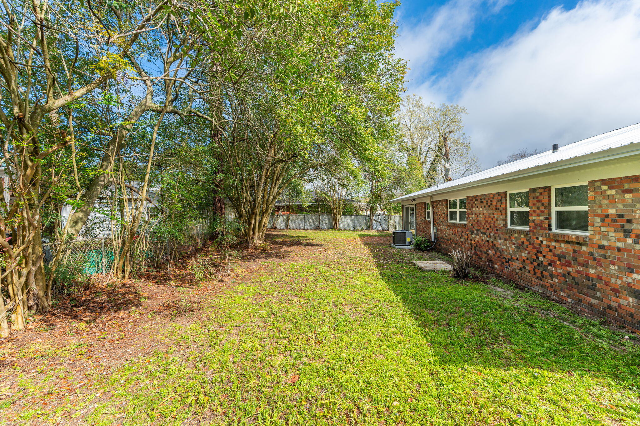 22543 Highway 331 Laurel Hill, FL 32567 - Photo 36 of 36 a view of a yard with plants and trees