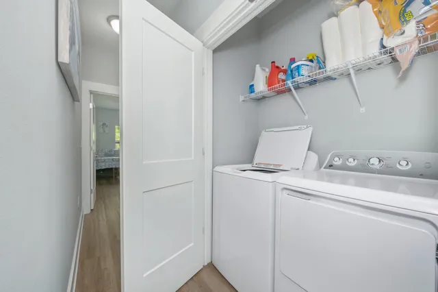 a utility room with dryer and washer