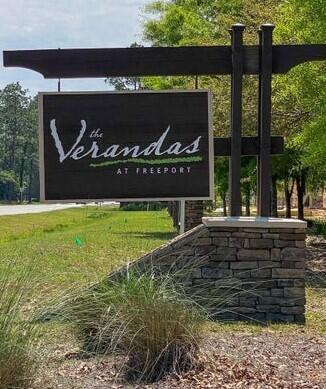 166 North Sand Palm Road Freeport, FL 32439 - Photo 22 of 23 a view of outdoor space with a garden