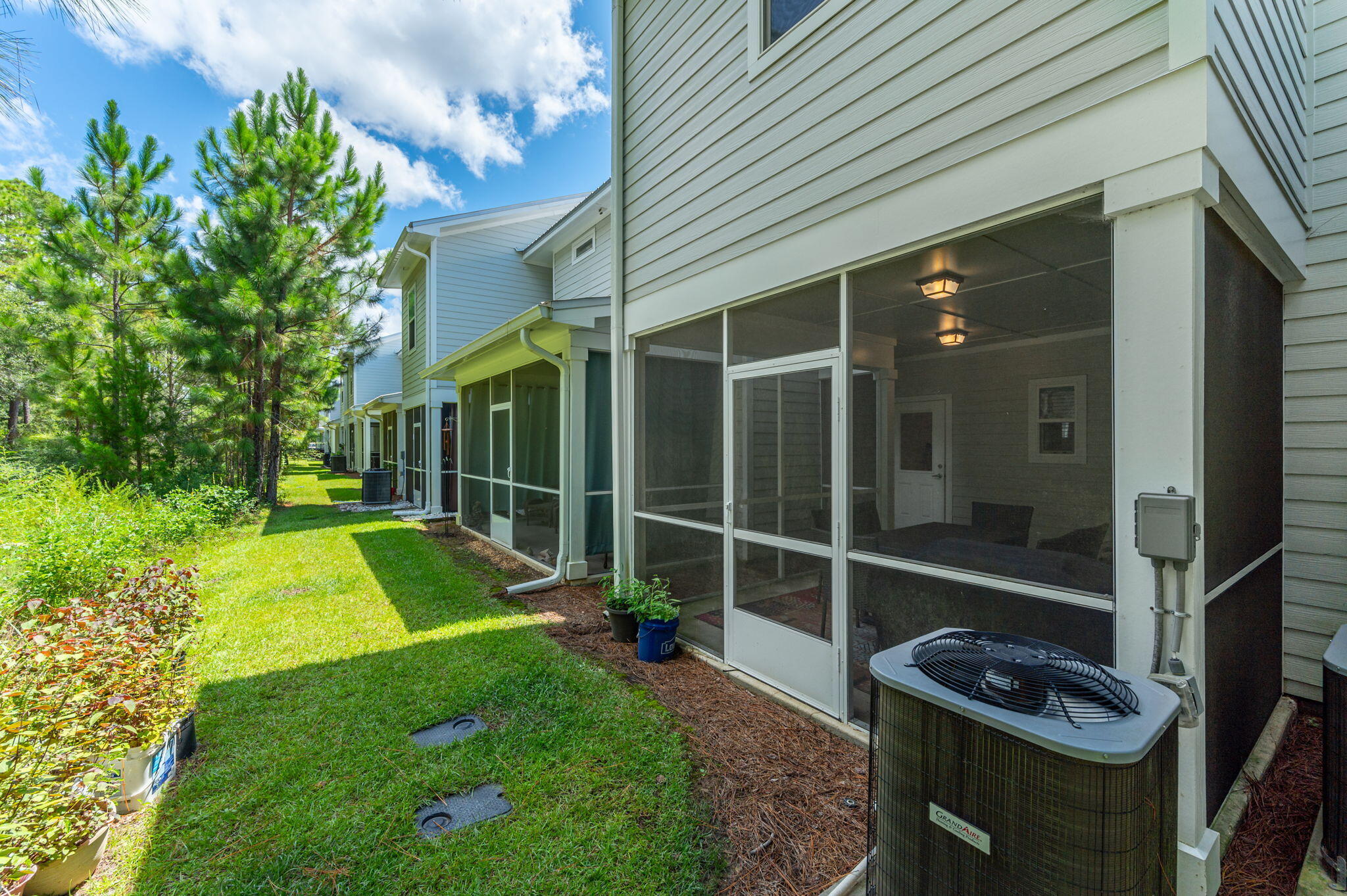 166 North Sand Palm Road Freeport, FL 32439 - Photo 9 of 23 a view of an house with backyard space and garden