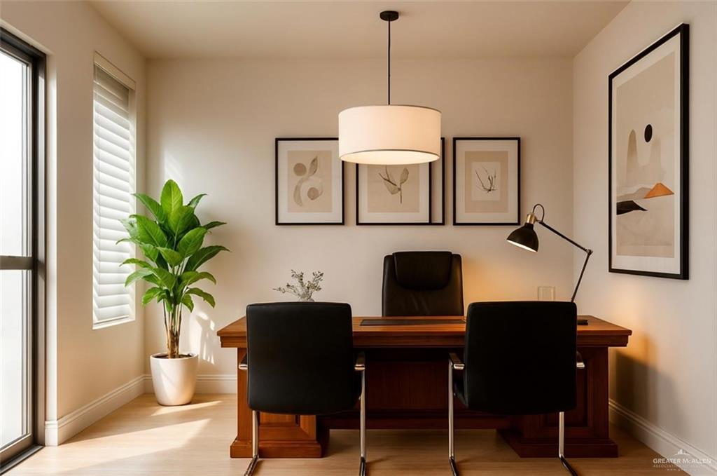 4905 Tyler, Unit 2 McAllen, TX 78503 - Photo 22 of 26 a view of a workspace with furniture and a potted plant