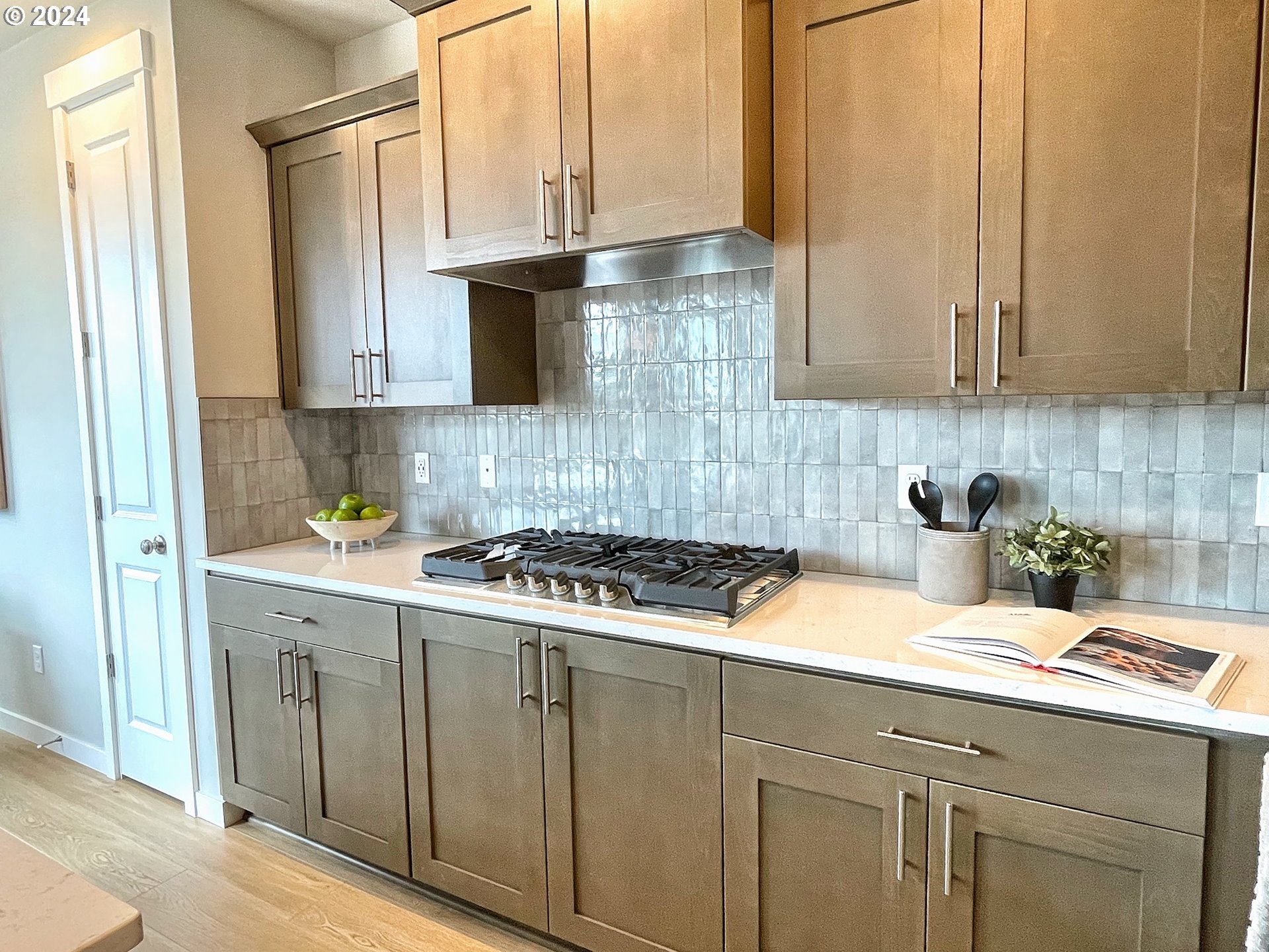 8719 North 3rd Street, Unit 39 Ridgefield, WA 98642 - Photo 3 of 21 a kitchen with stainless steel appliances granite countertop a sink a stove and a microwave