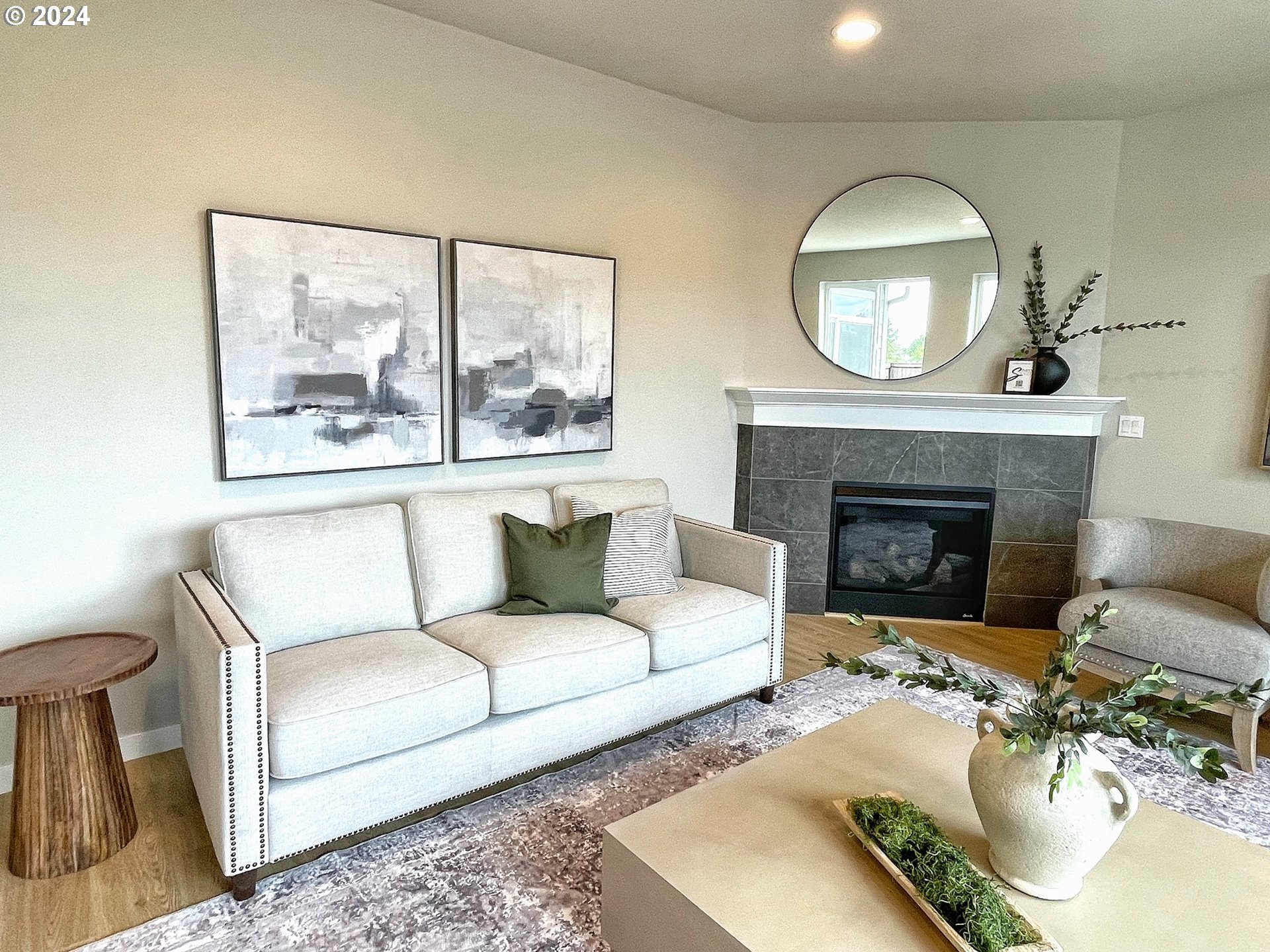 8719 North 3rd Street, Unit 39 Ridgefield, WA 98642 - Photo 7 of 21 a living room with furniture and a fireplace