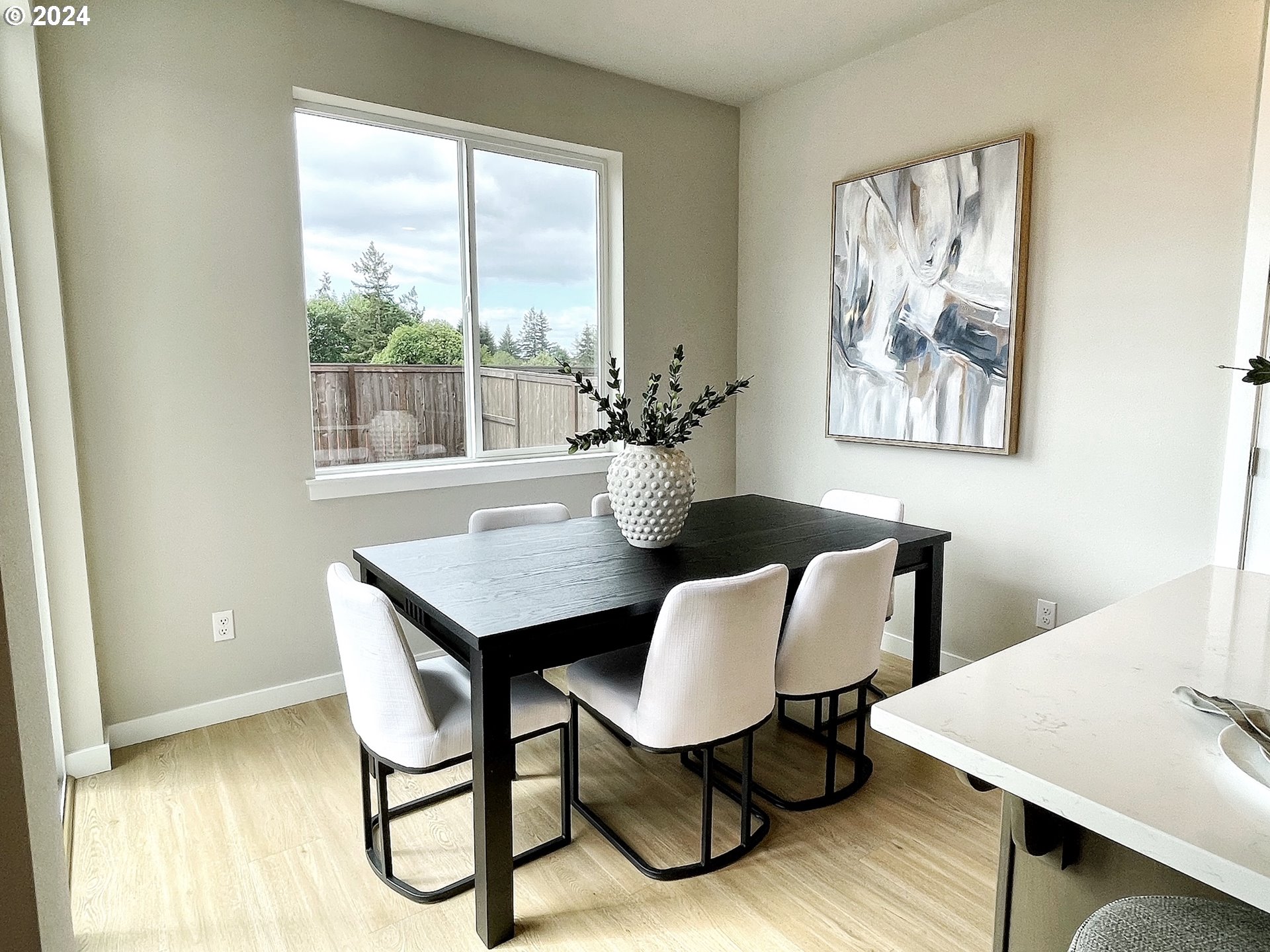 8719 North 3rd Street, Unit 39 Ridgefield, WA 98642 - Photo 8 of 21 a view of a dining room with furniture window and outside view