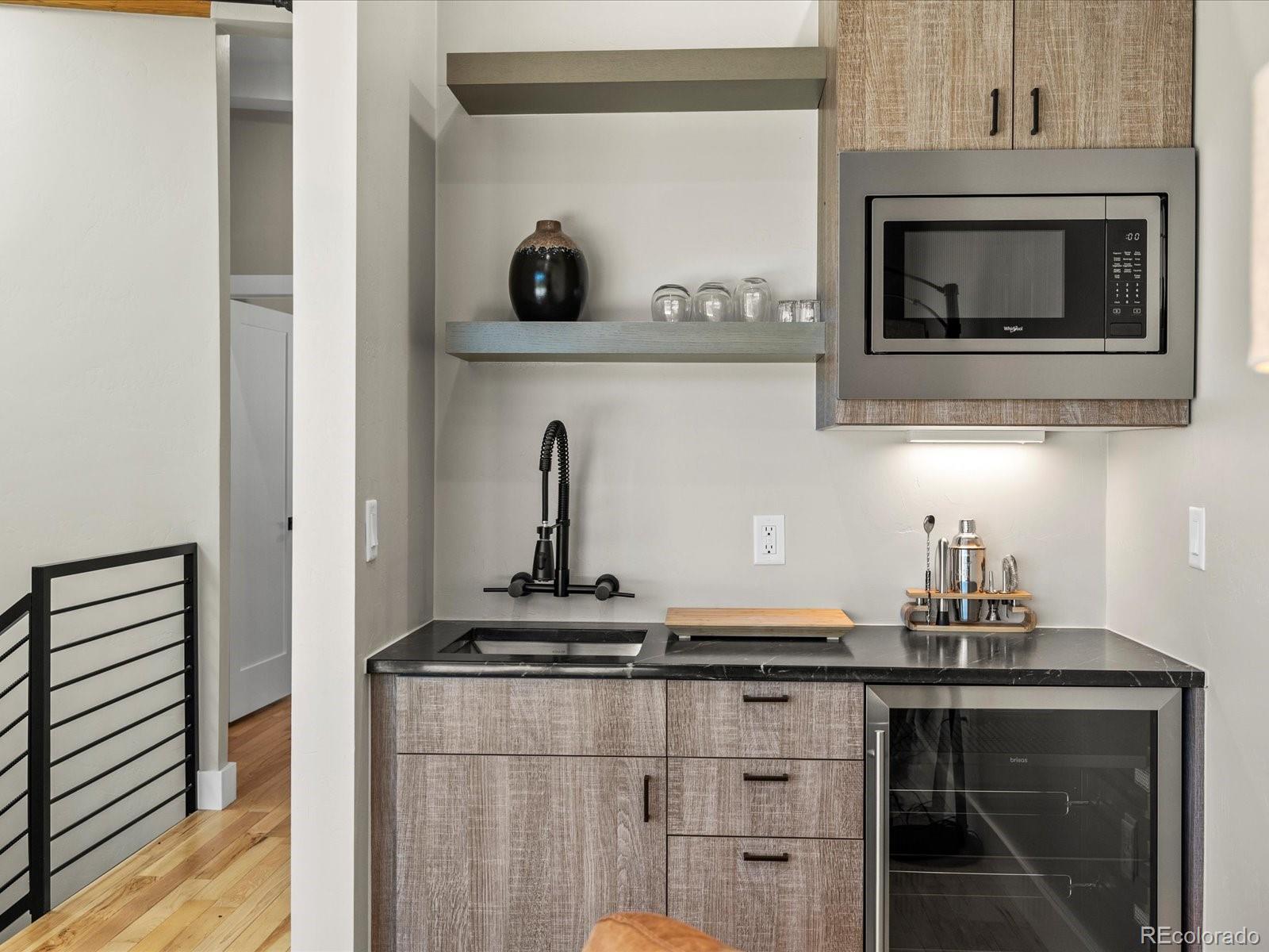 718 Emerson Gulch Road Boulder, CO 80302 - Photo 29 of 42 a kitchen with a stove and a microwave