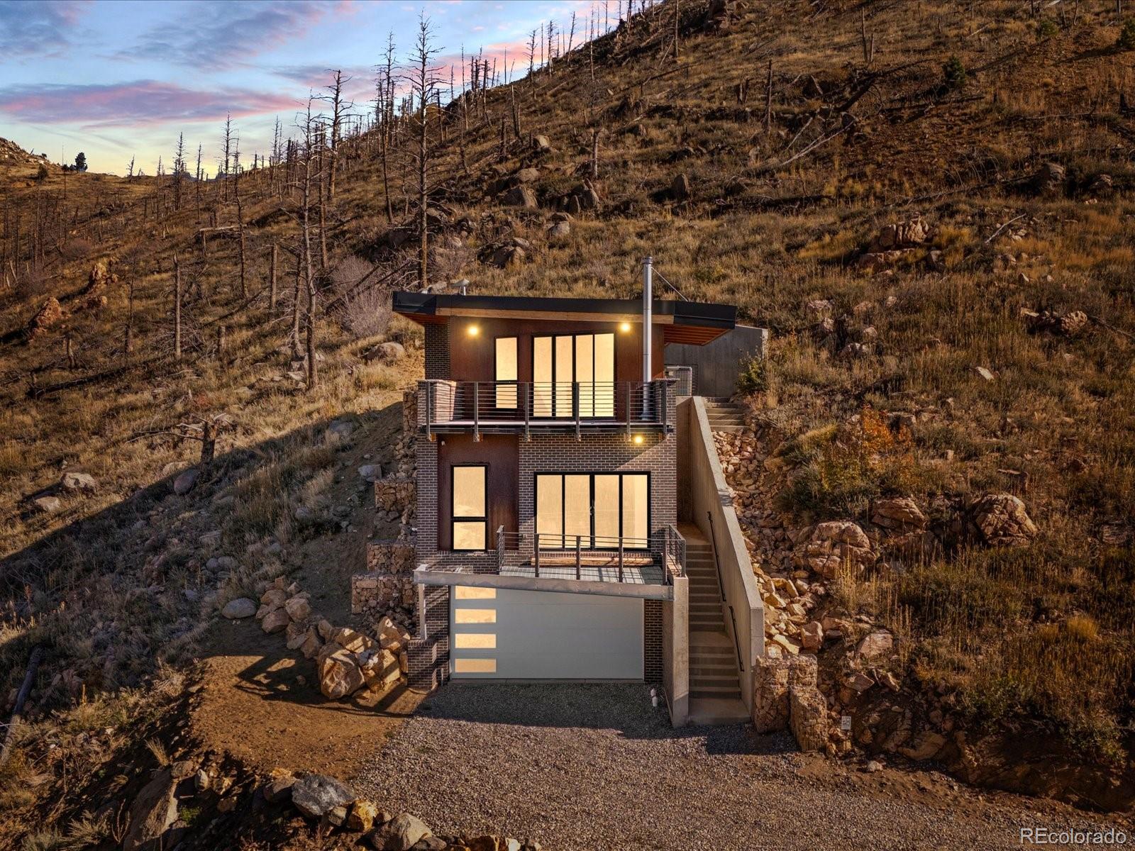 718 Emerson Gulch Road Boulder, CO 80302 - Photo 38 of 42 a front view of a house