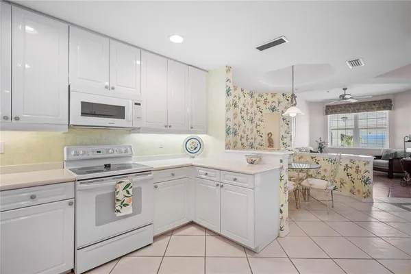 $550,000 | 242 Hidden Bay Drive, Unit 603, Osprey, FL 34229