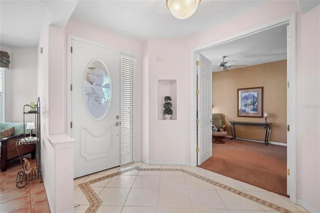 an aerial view of a houses with a lake view