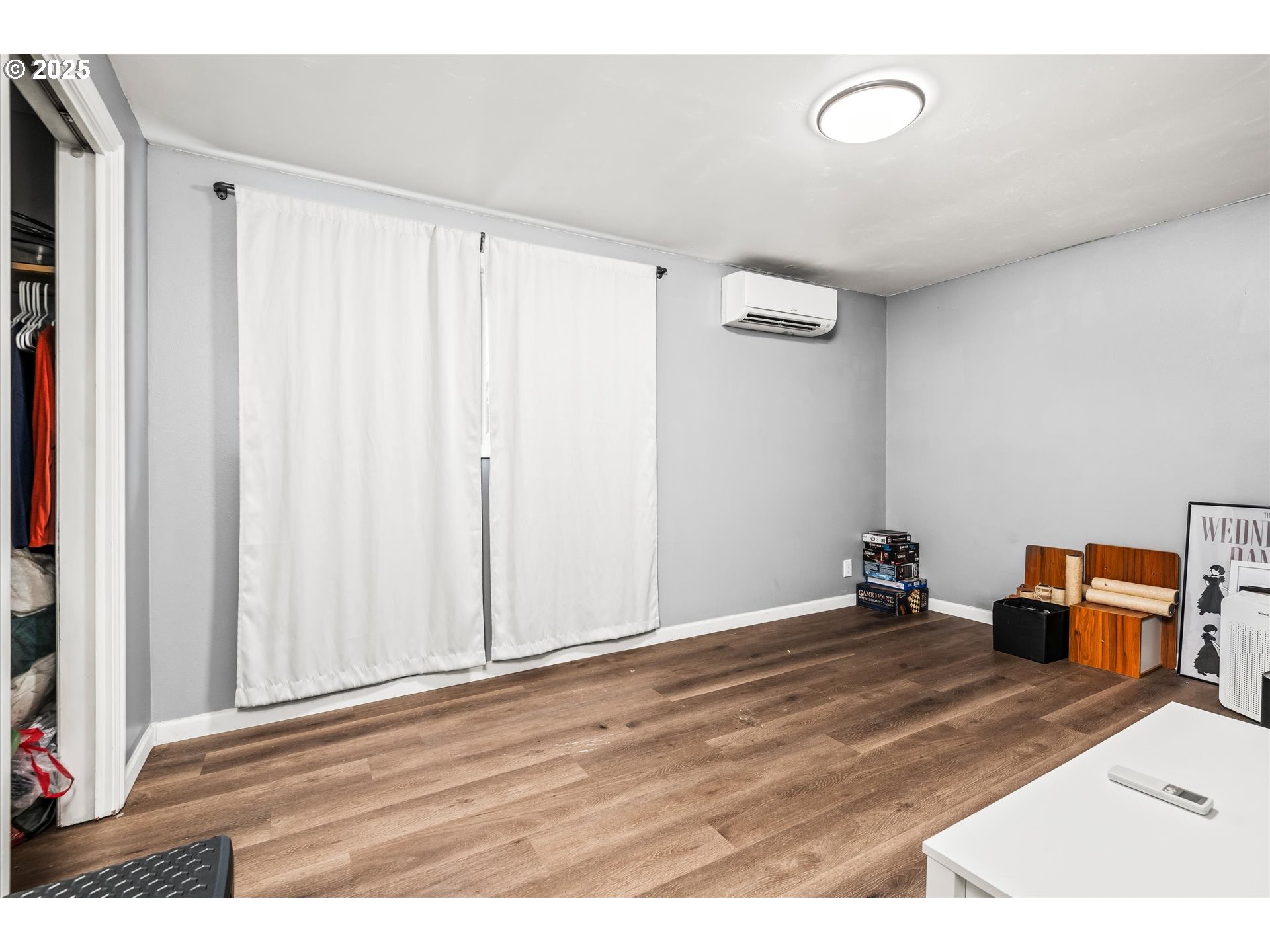 1310 Corum Avenue Eugene, OR 97401 - Photo 17 of 28 a view of a room with wooden floor and a window