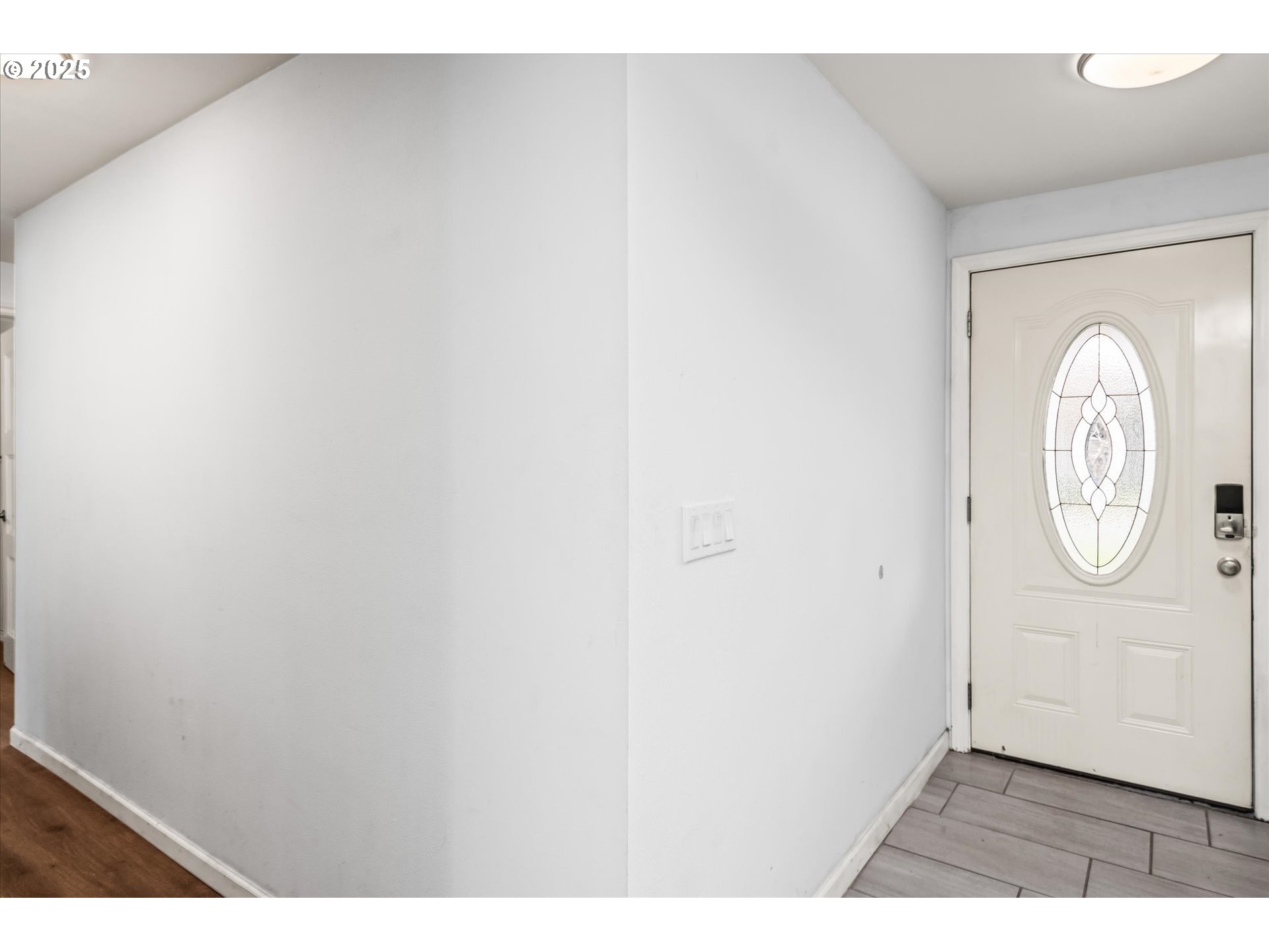 1310 Corum Avenue Eugene, OR 97401 - Photo 5 of 28 a view of entryway with wooden floor
