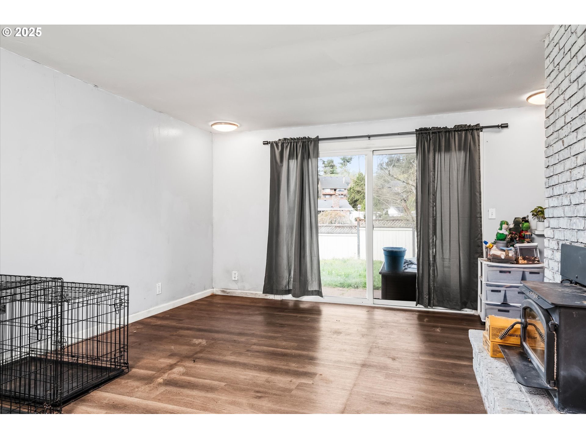 1310 Corum Avenue Eugene, OR 97401 - Photo 8 of 28 a view of livingroom with furniture and window