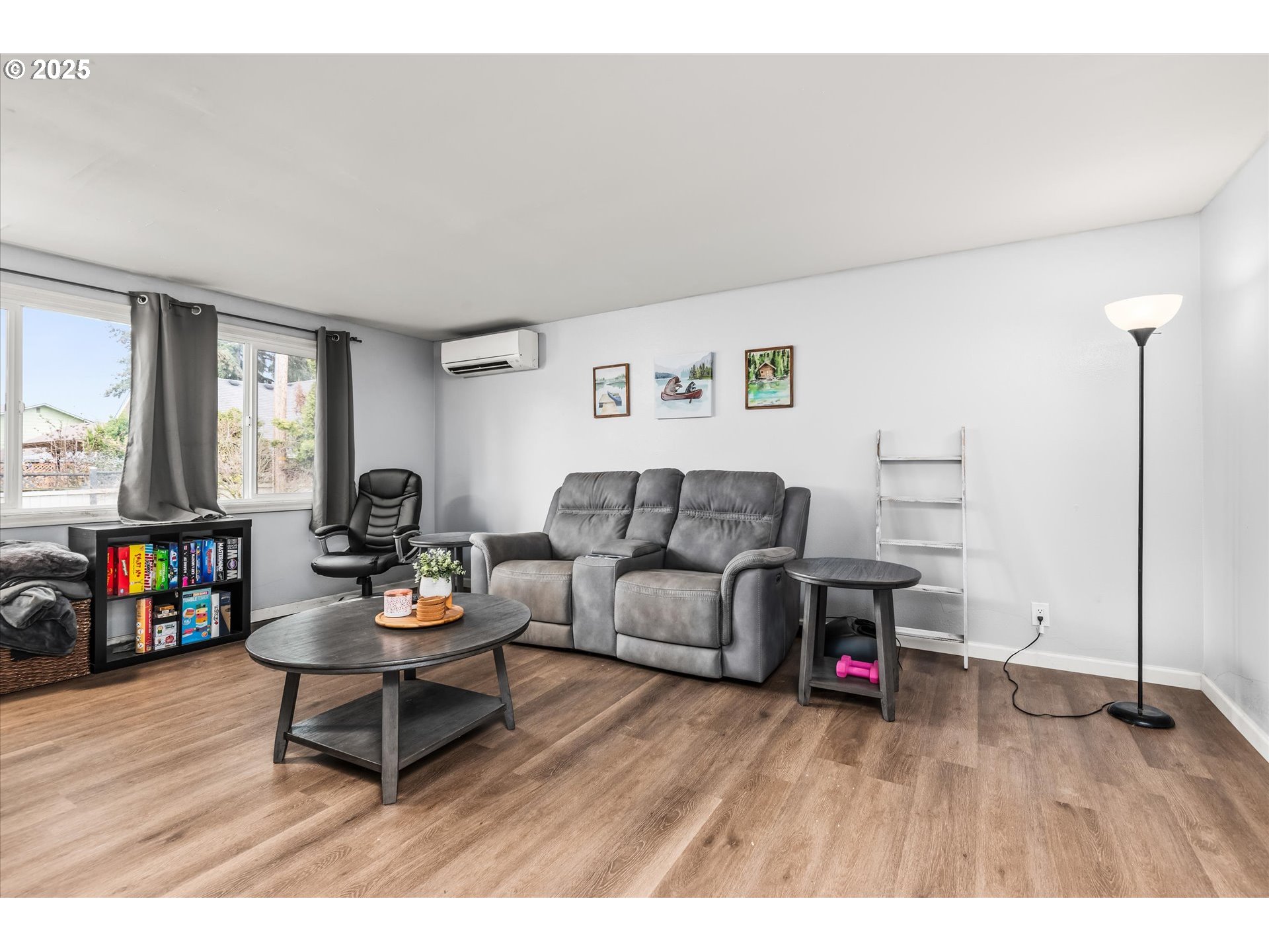 1310 Corum Avenue Eugene, OR 97401 - Photo 9 of 28 a living room with furniture and a wooden floor