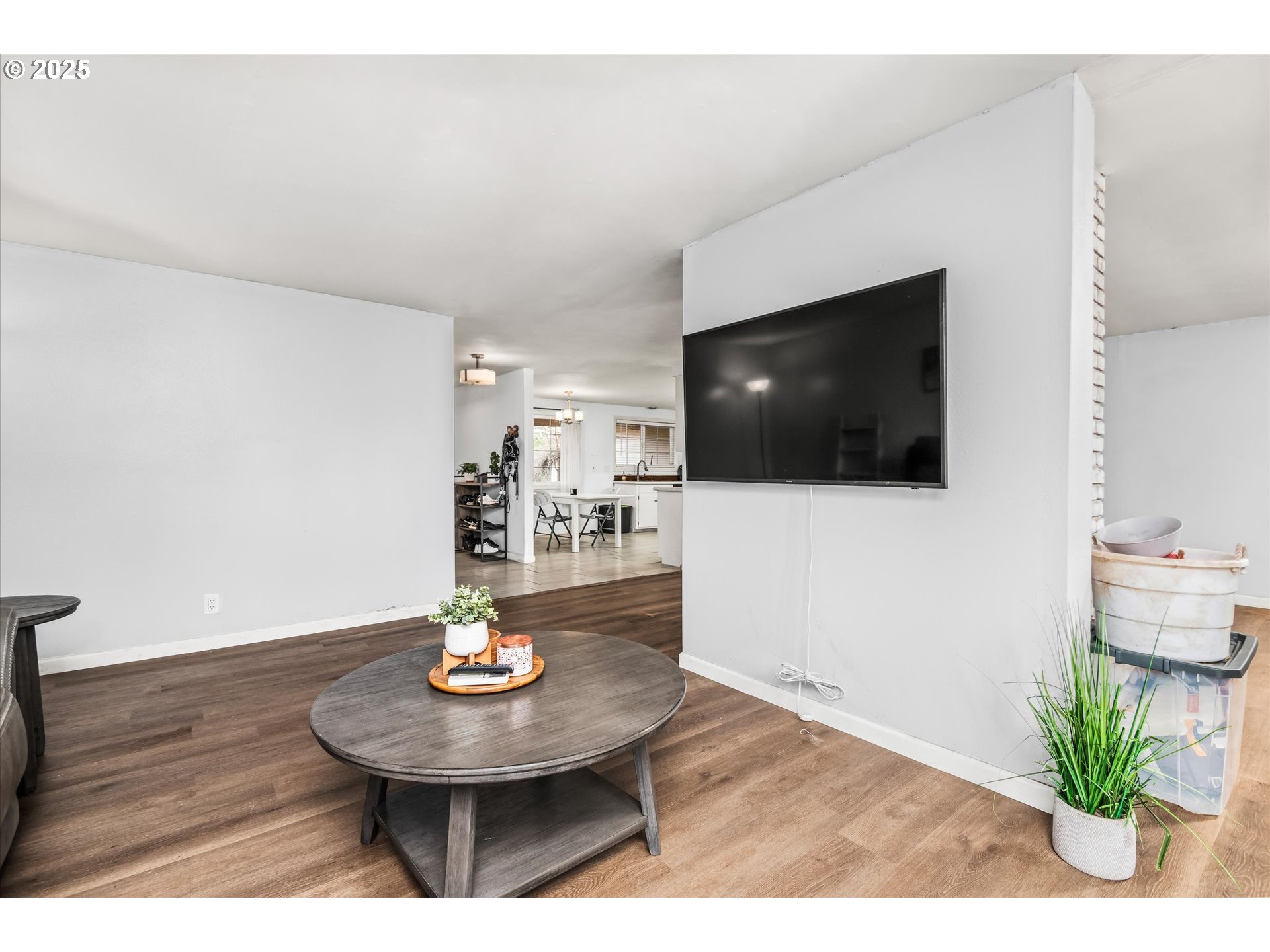 1310 Corum Avenue Eugene, OR 97401 - Photo 10 of 28 a living room with furniture and a flat screen tv
