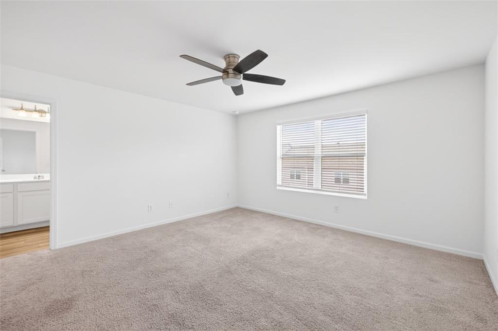 64 Thetford Way Winder, GA 30680 - Photo 15 of 41 a view of an empty room with a window