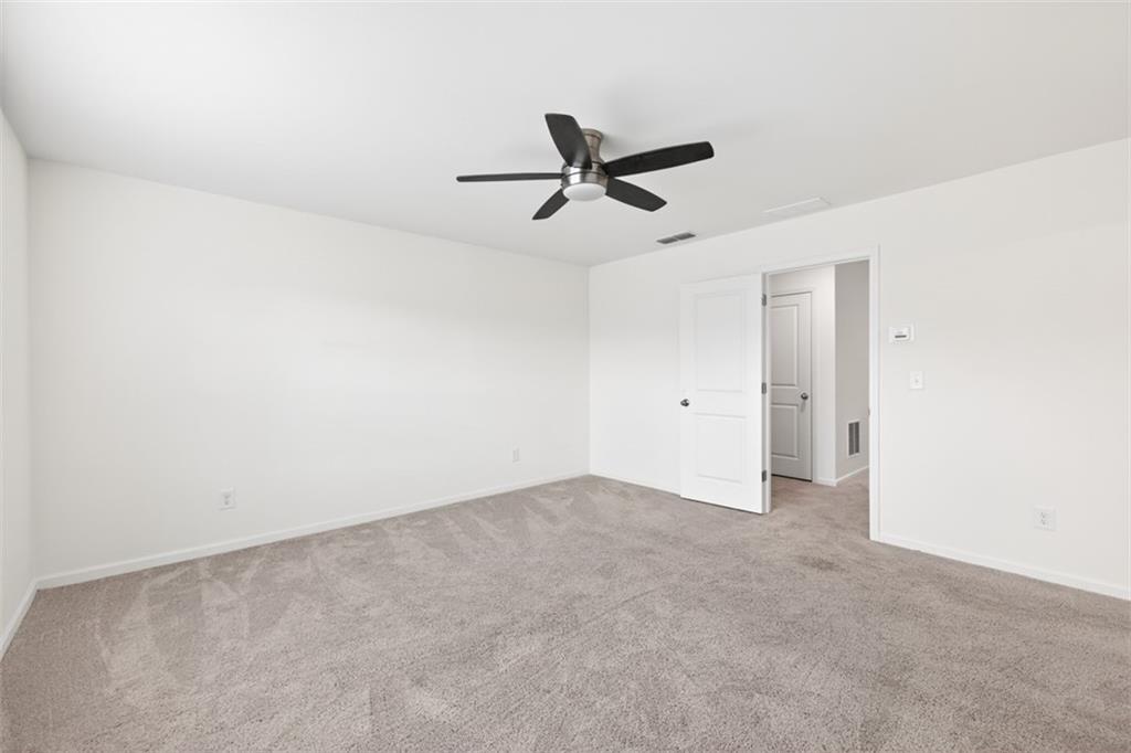 64 Thetford Way Winder, GA 30680 - Photo 17 of 41 a view of an empty room