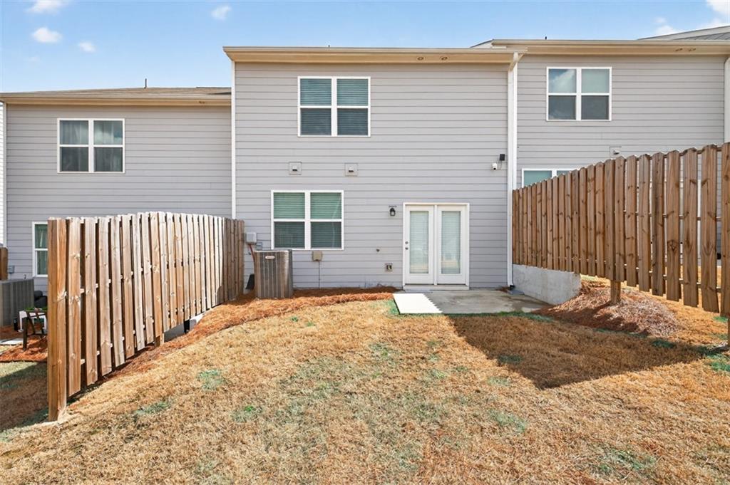64 Thetford Way Winder, GA 30680 - Photo 35 of 41 a view of backyard with wooden fence
