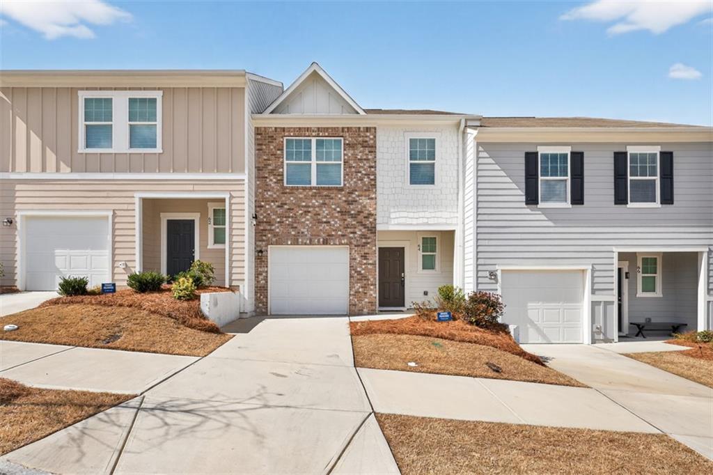 64 Thetford Way Winder, GA 30680 - Photo 41 of 41 a front view of a house with yard