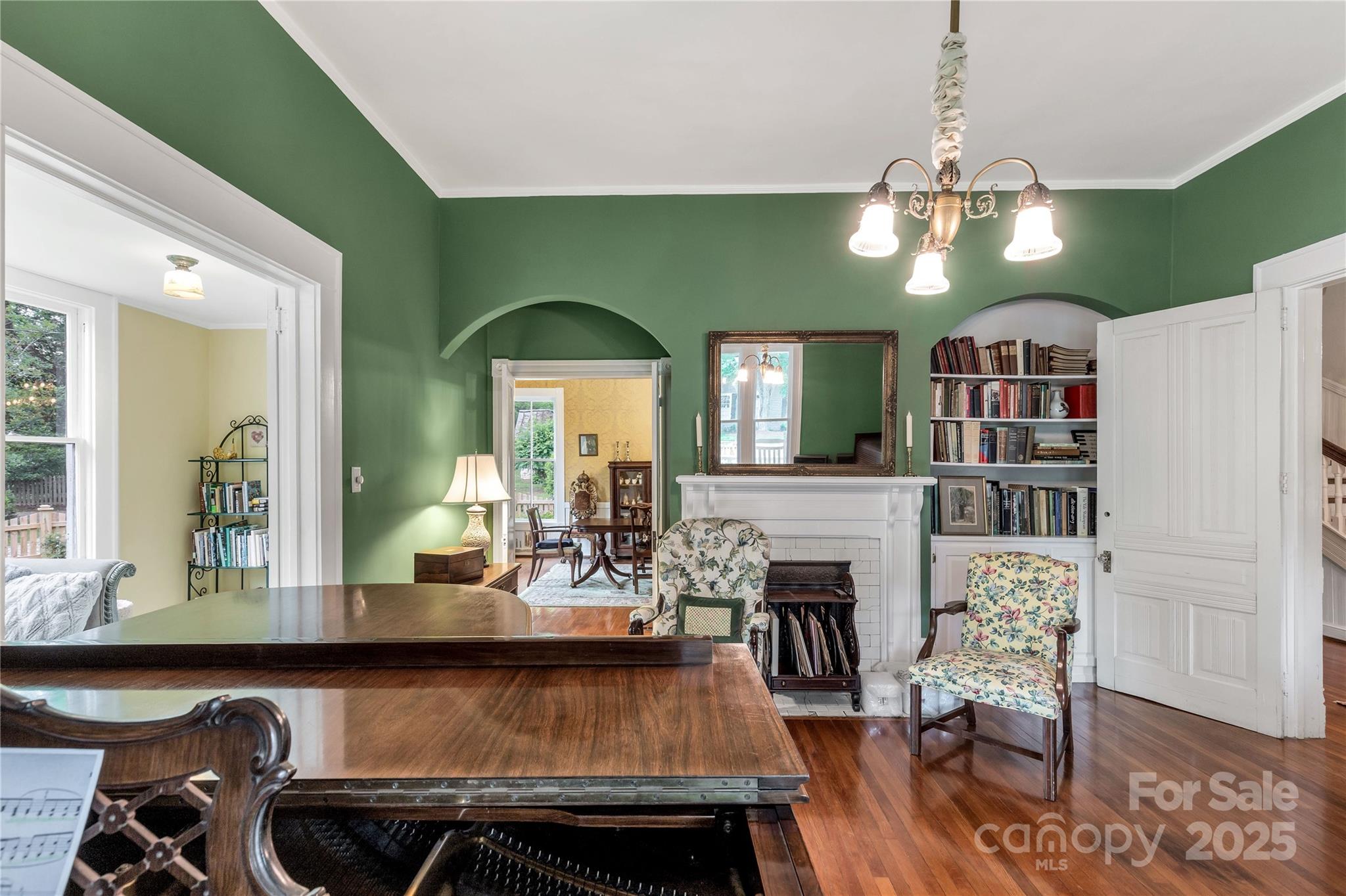 7 Kings Mountain Street York, SC 29745 - Photo 11 of 46 a living room with fireplace furniture and a wooden floor