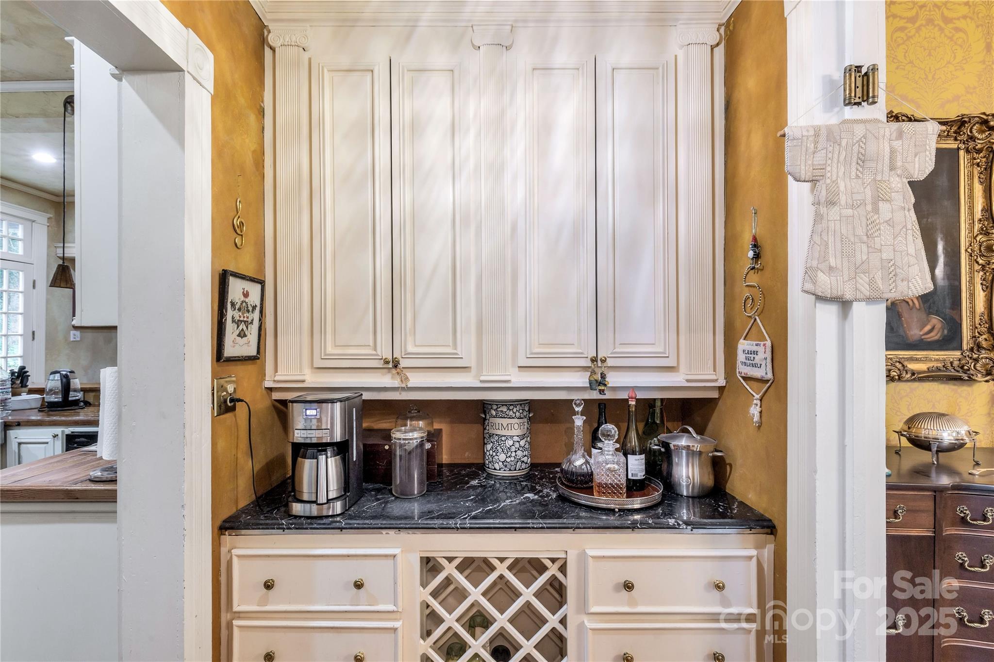 7 Kings Mountain Street York, SC 29745 - Photo 16 of 46 a kitchen with stainless steel appliances granite countertop a sink and a white cabinets