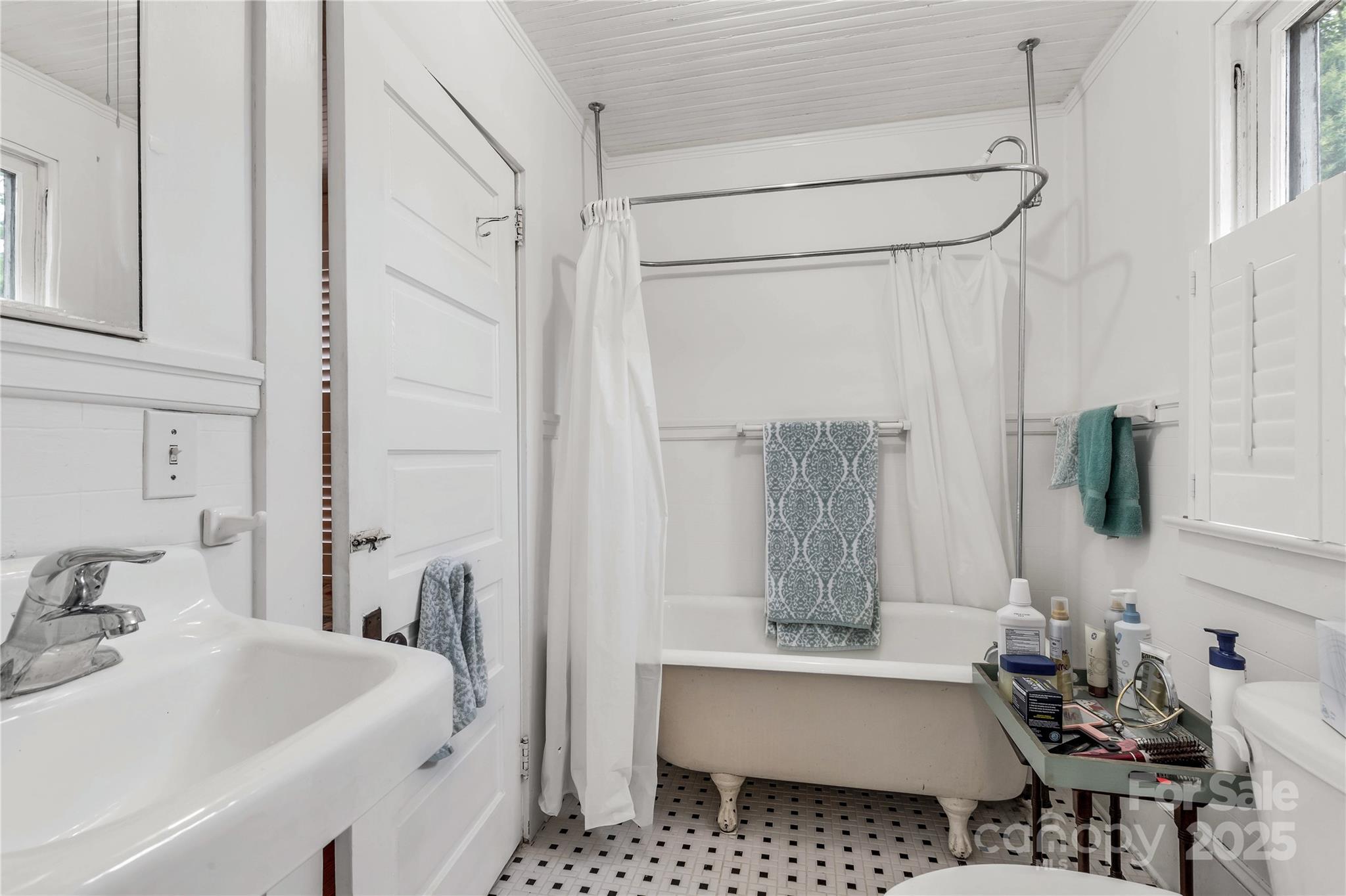 7 Kings Mountain Street York, SC 29745 - Photo 25 of 46 a bathroom with a sink vanity tub and a mirror