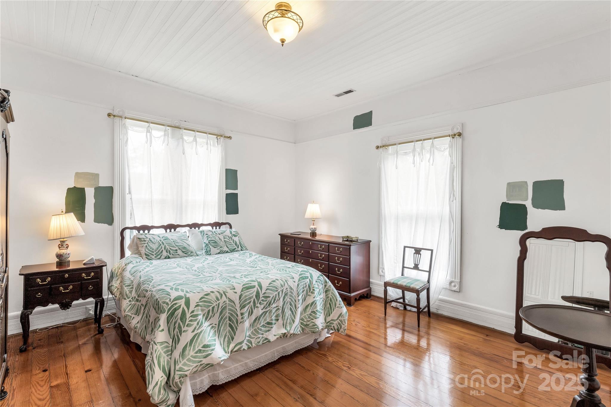 7 Kings Mountain Street York, SC 29745 - Photo 27 of 46 a bedroom with a bed wooden floor and window