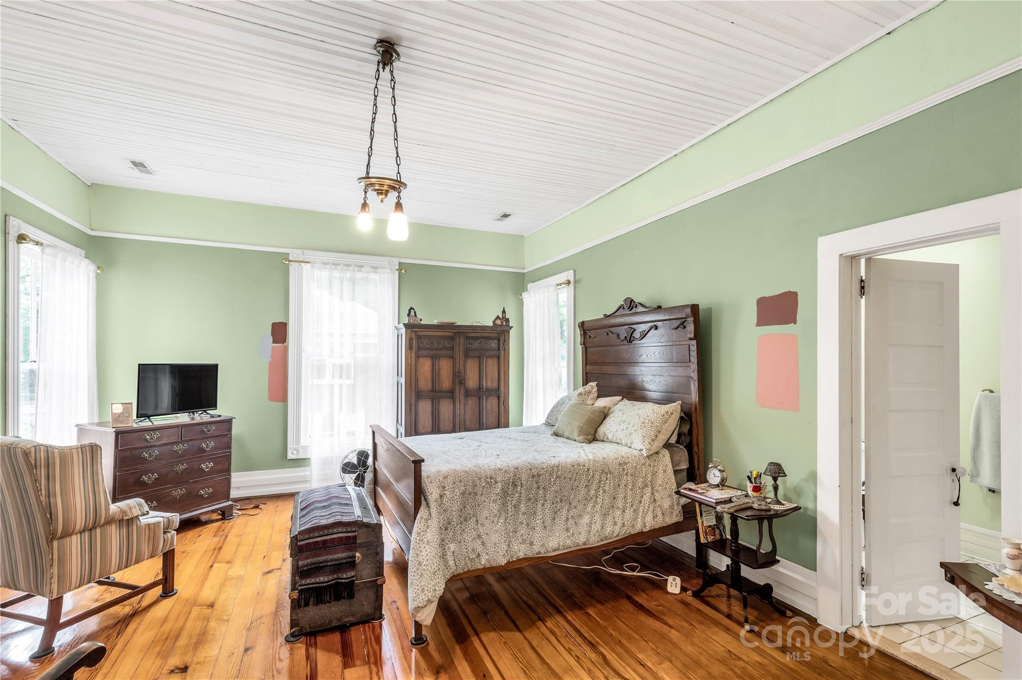 7 Kings Mountain Street York, SC 29745 - Photo 29 of 46 a bedroom with furniture and a wooden floor