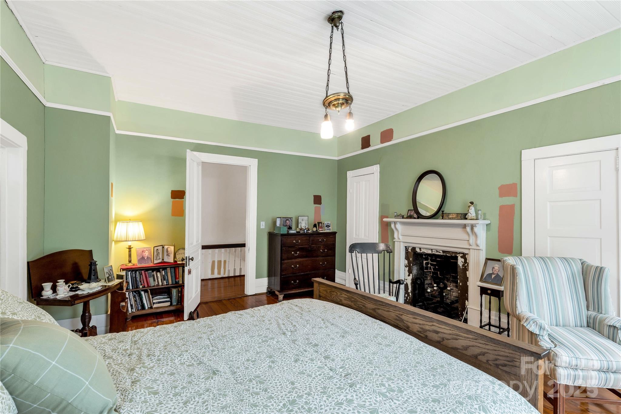 7 Kings Mountain Street York, SC 29745 - Photo 30 of 46 a living room with furniture a fireplace and a flat screen tv
