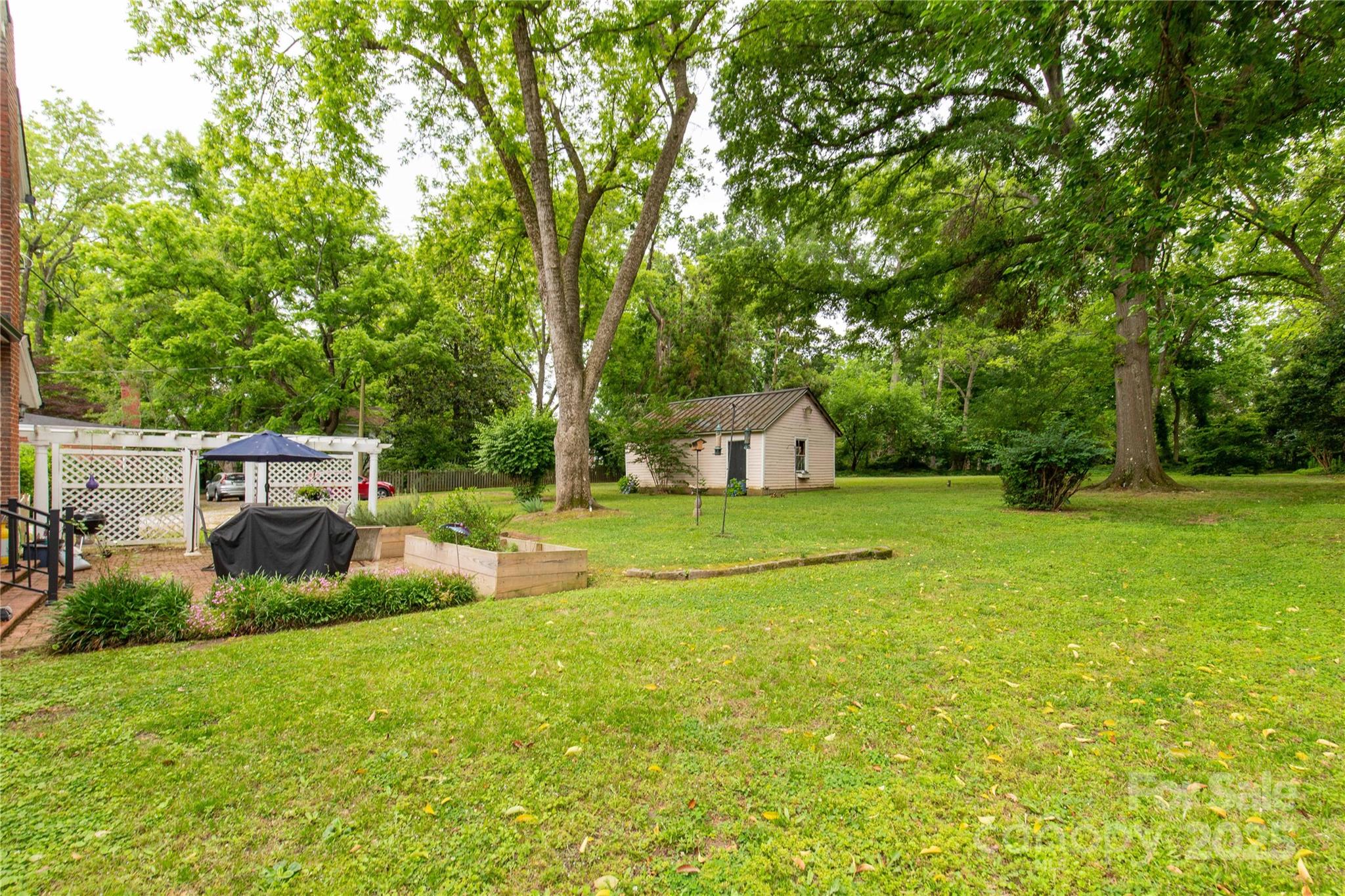 7 Kings Mountain Street York, SC 29745 - Photo 37 of 46 a view of a house with backyard