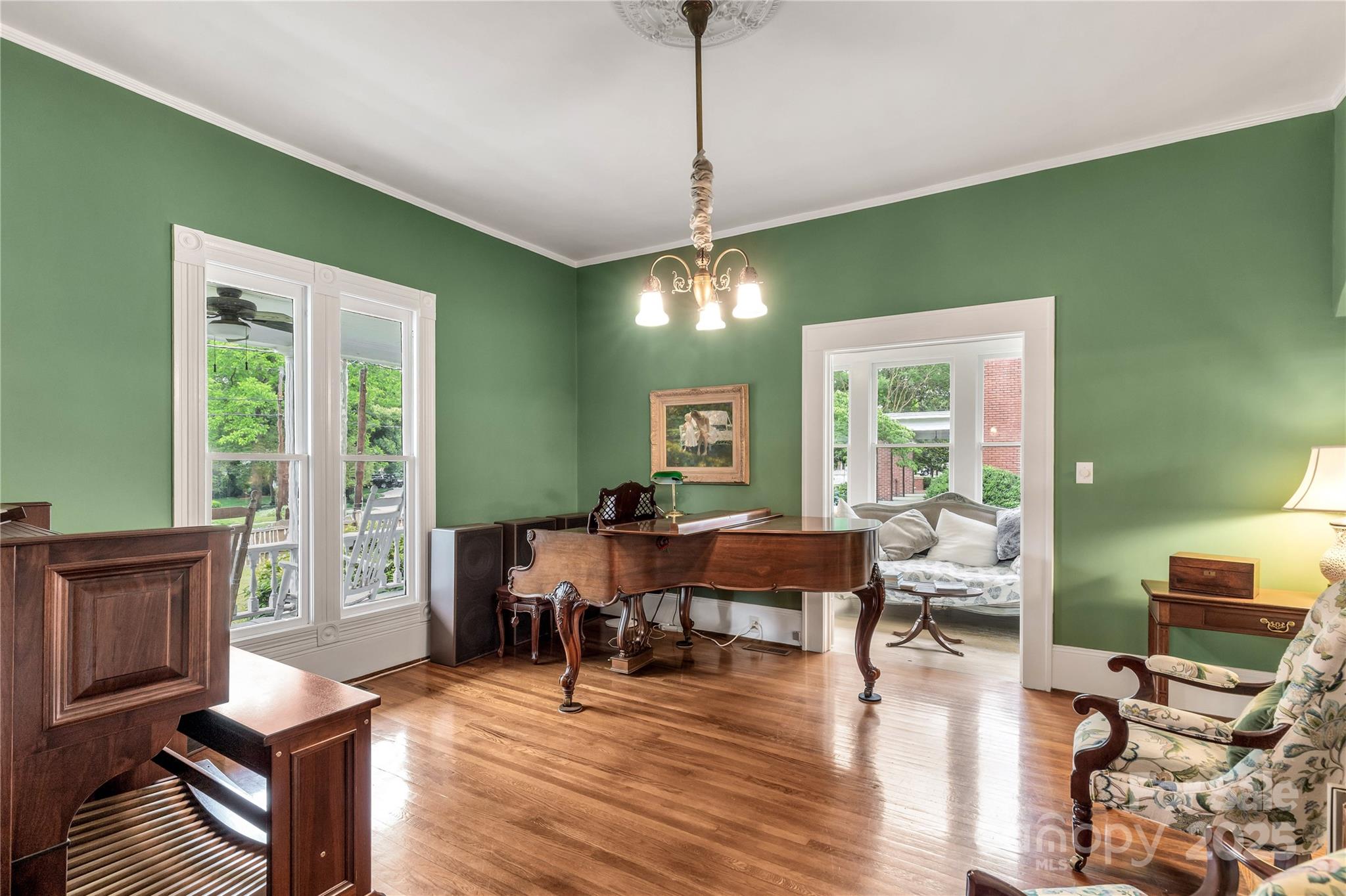 7 Kings Mountain Street York, SC 29745 - Photo 10 of 46 a living room with furniture a wooden floor and a window