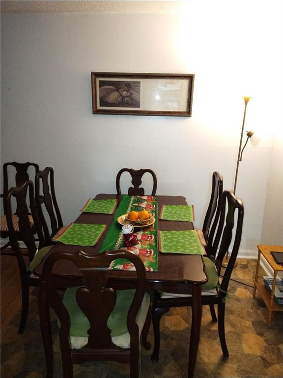 3398 Columbia Trace Decatur, GA 30032 - Photo 4 of 10 a view of a dining room with furniture and window