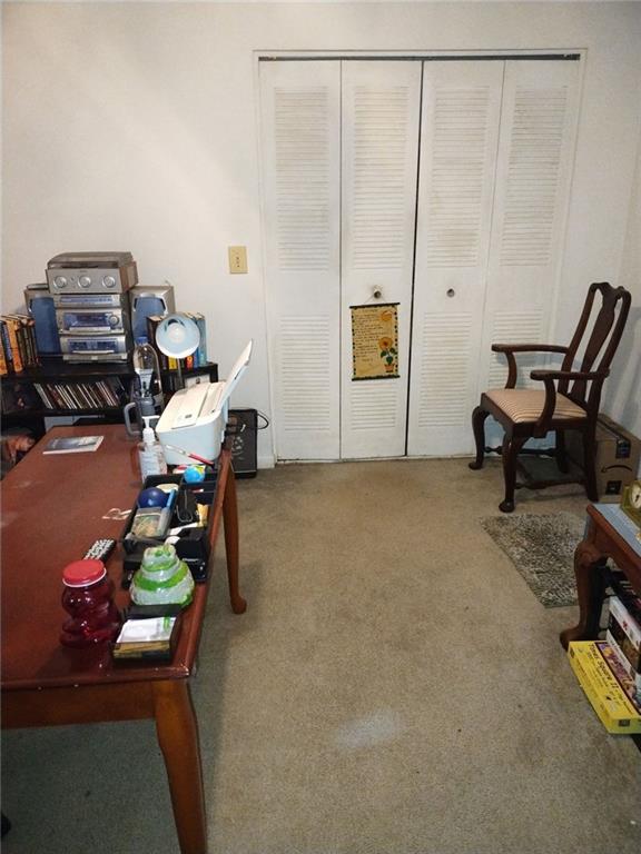 3398 Columbia Trace Decatur, GA 30032 - Photo 6 of 10 a living room with furniture a couch and a window