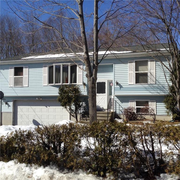 a front view of a house with yard
