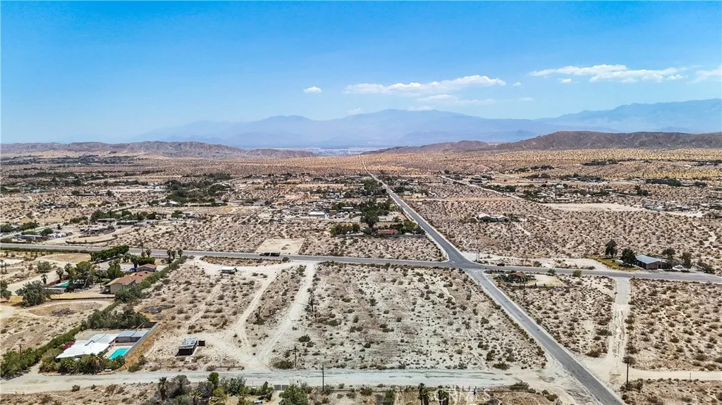 5 Dillon Road Desert Hot Springs, CA 92241 - Photo 9 of 25 an aerial view of residential building and street