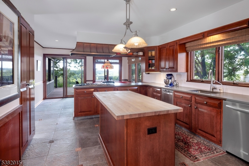 14 Hunter Road West Amwell, NJ 08530 - Photo 12 of 41 a kitchen with stainless steel appliances granite countertop sink stove and refrigerator