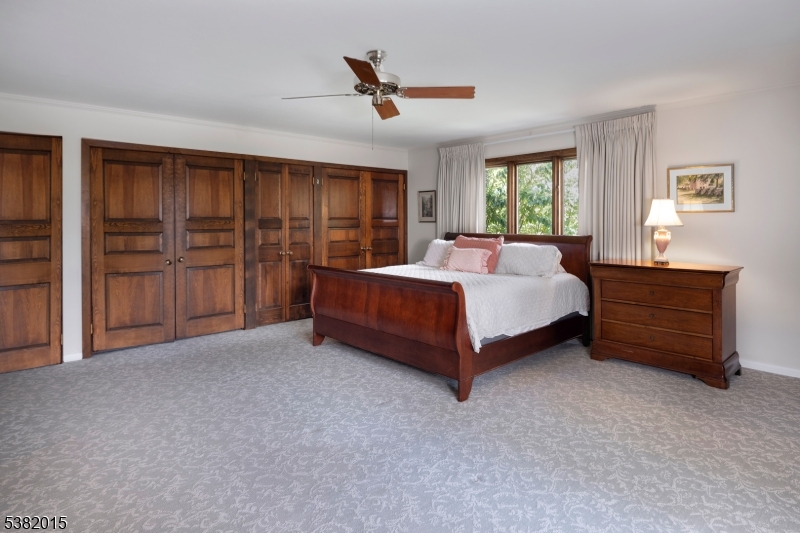 14 Hunter Road West Amwell, NJ 08530 - Photo 15 of 41 a bed sitting in a spacious bedroom next to a window