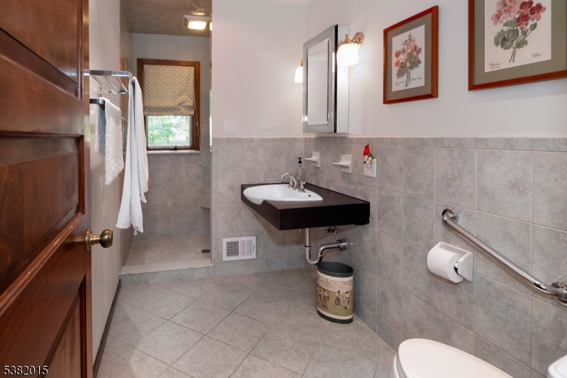 14 Hunter Road West Amwell, NJ 08530 - Photo 20 of 41 a bathroom with a sink toilet and a mirror