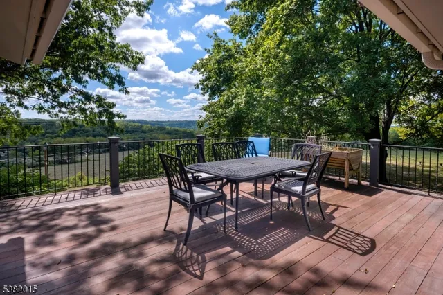 a view of a backyard with sitting area