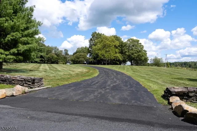 a view of a golf course with a lake