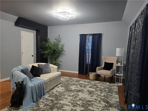 a living room with furniture and a couch