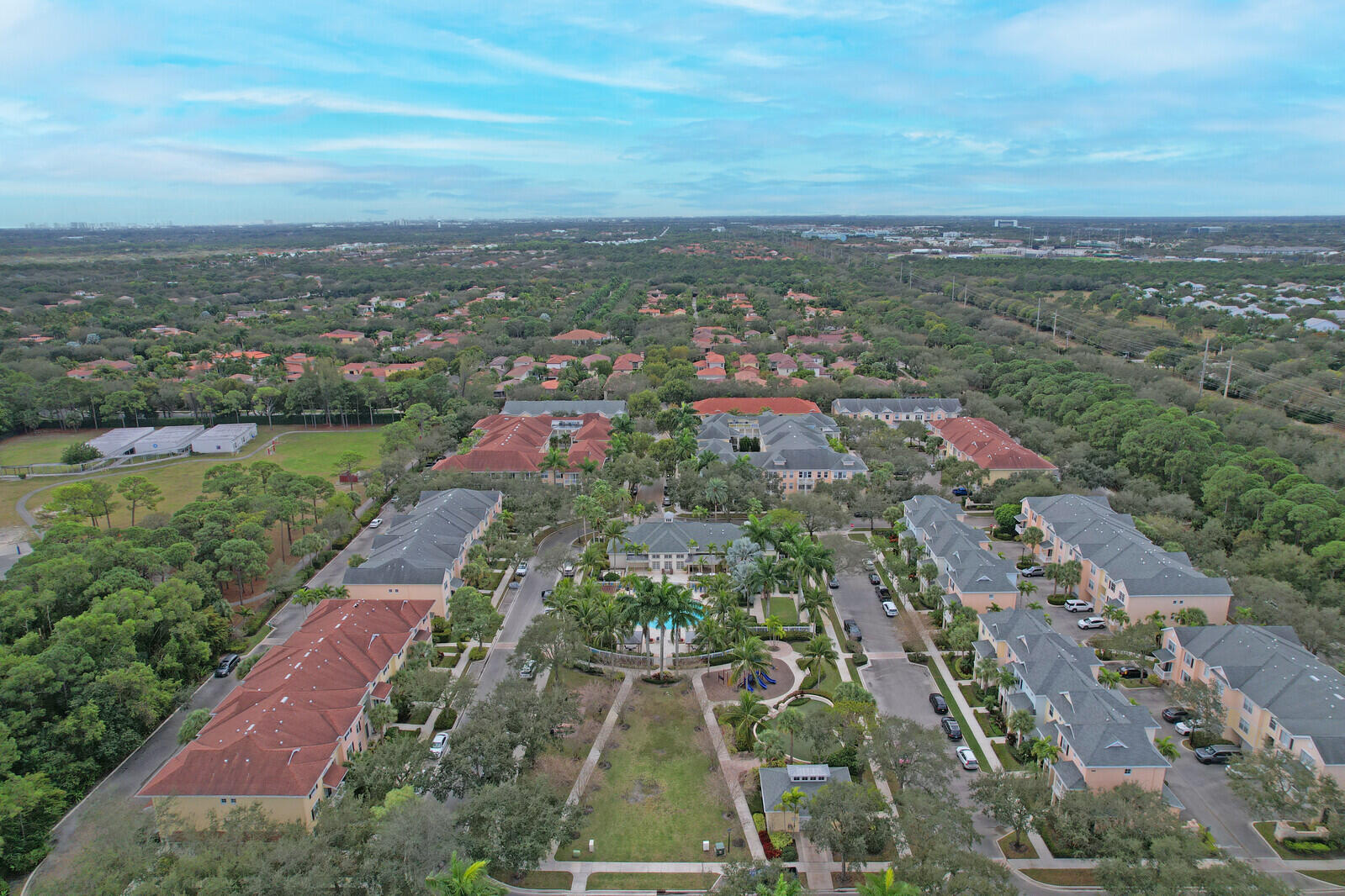255 Murcia Drive, Unit 202 Jupiter, FL 33458 - Photo 56 of 56 an aerial view of residential houses with outdoor space and street view